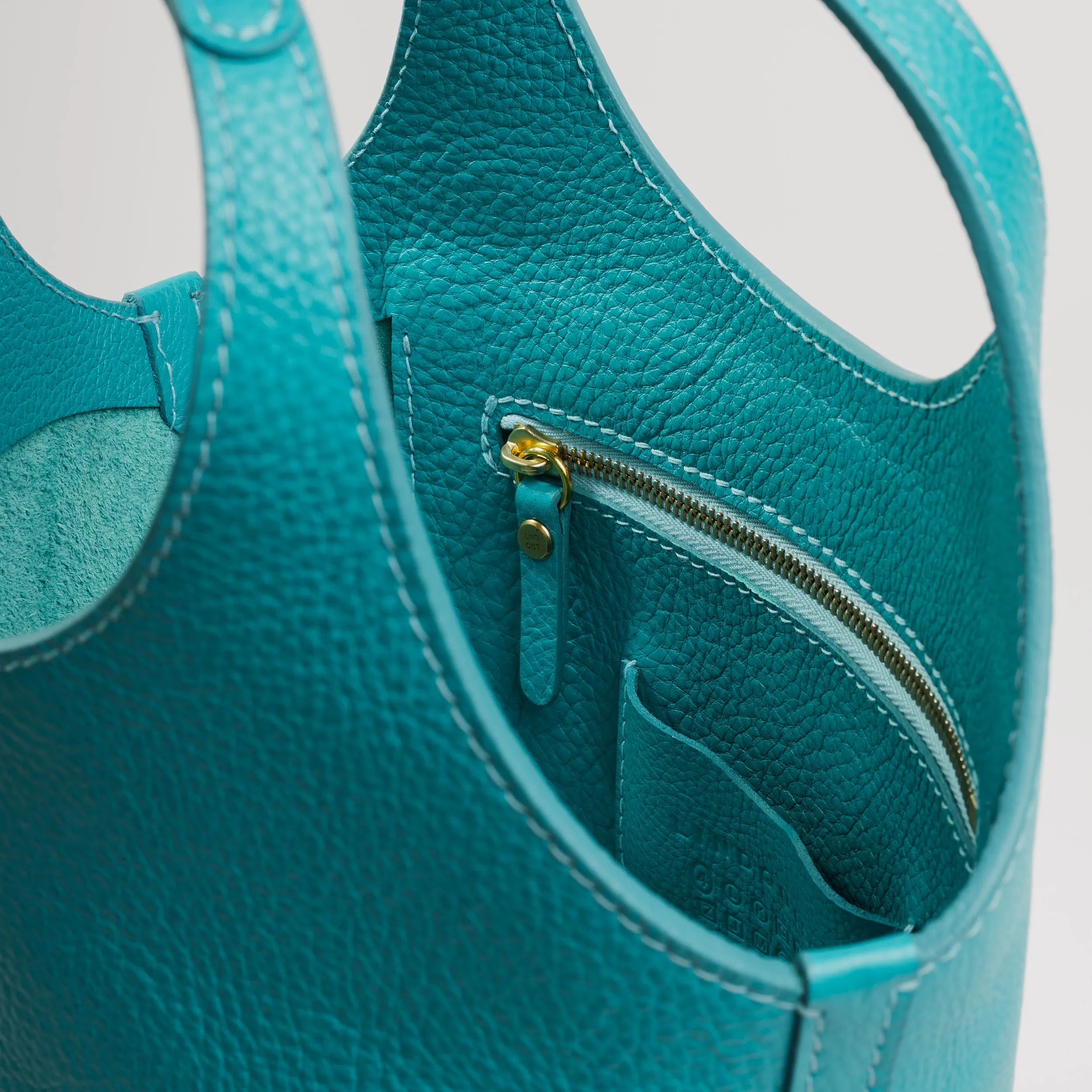 Ama in Turquoise