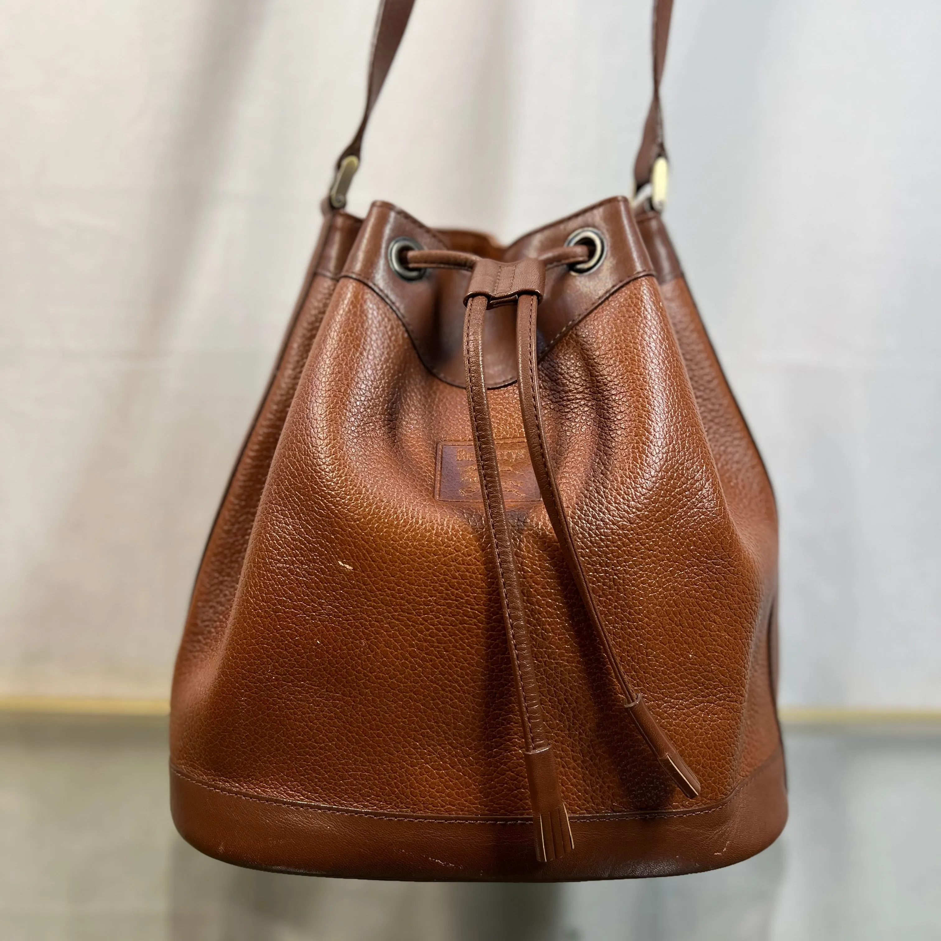 BURBERRYs Brown Grained Leather Vintage Drawstring Bucket Bag