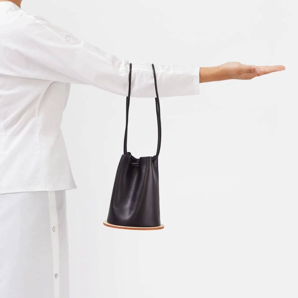 Disc in Black Bucket Bag