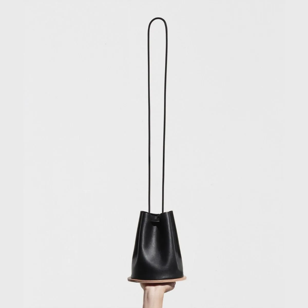 Disc in Black Bucket Bag