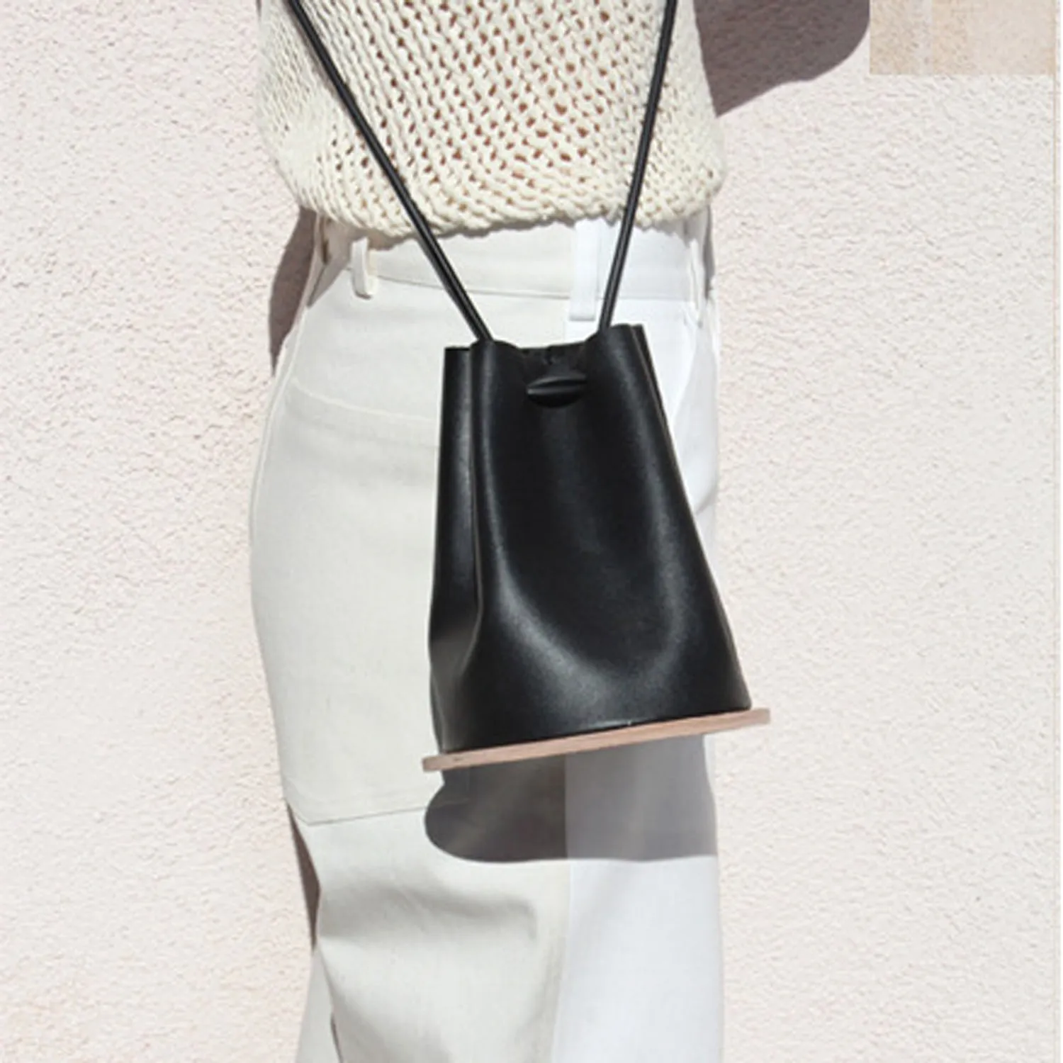 Disc in Black Bucket Bag