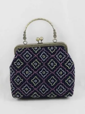 Pochette à poignée brodée et à fleurs teintes en indigo