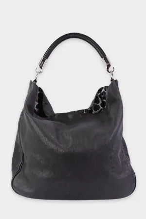 Saint Laurent Black Leather Hobo Handbag with Leopard Print in the Interior